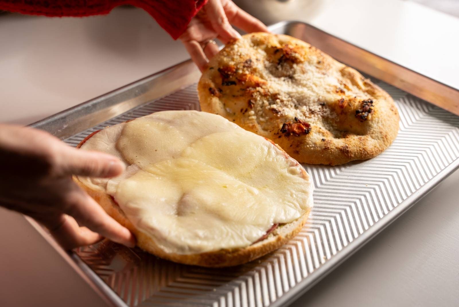 Melting cheese on grinder sandwich.