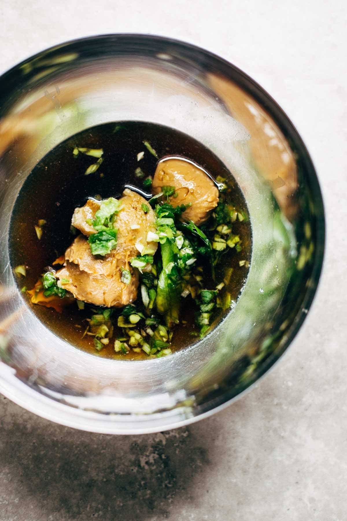 Creamy Miso Peanut Chicken Lettuce Wraps - grilled chicken and juicy grapes tossed with a simple creamy miso-peanut sauce. Super easy and healthy recipe! | pinchofyum.com