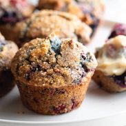 Mixed Berry Muffins on a plate.